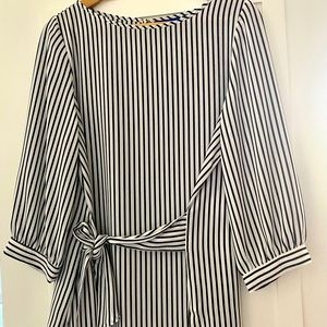 4 tops sold as a group of 4 only. Like new